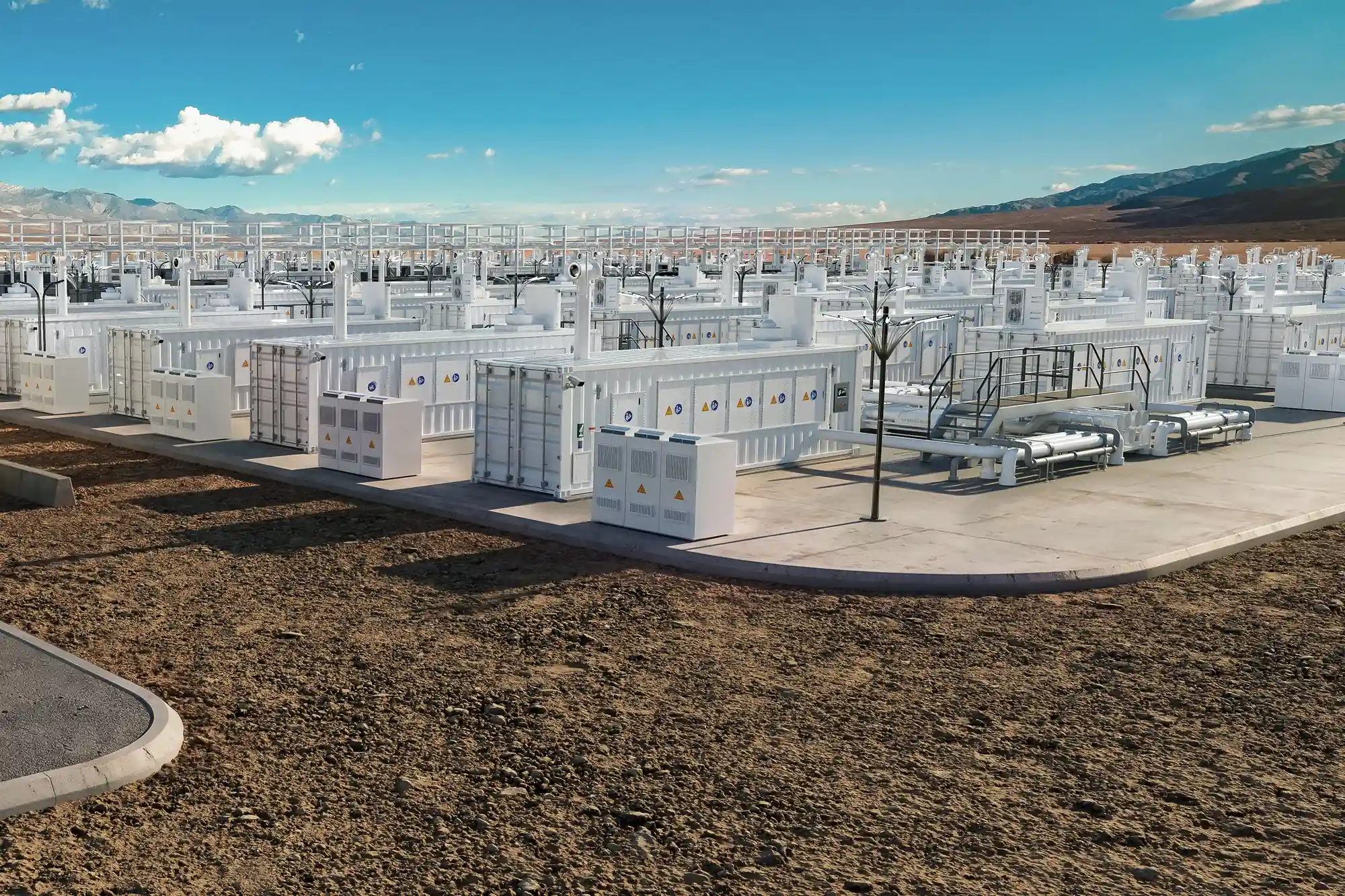 Project render of BaseBlue Power: rows of white containerized power blocks and piping on a desert site under blue sky