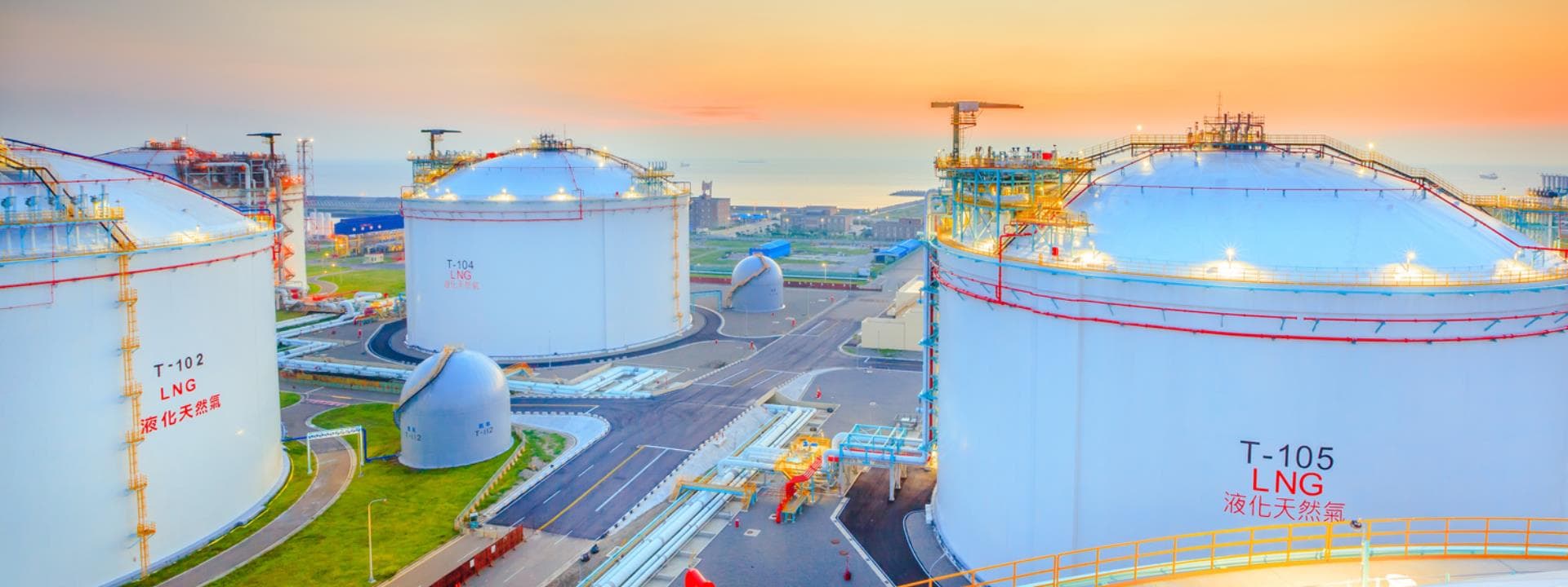 White LNG storage tanks at dusk, in an image from CPC Corp., Taiwan, one of two state energy firms named in the story