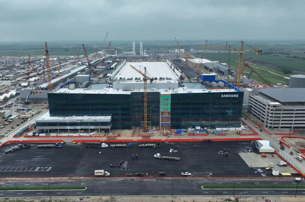 Aerial view of Samsung's Taylor, Texas semiconductor fab under construction, with cranes around the Samsung-branded building