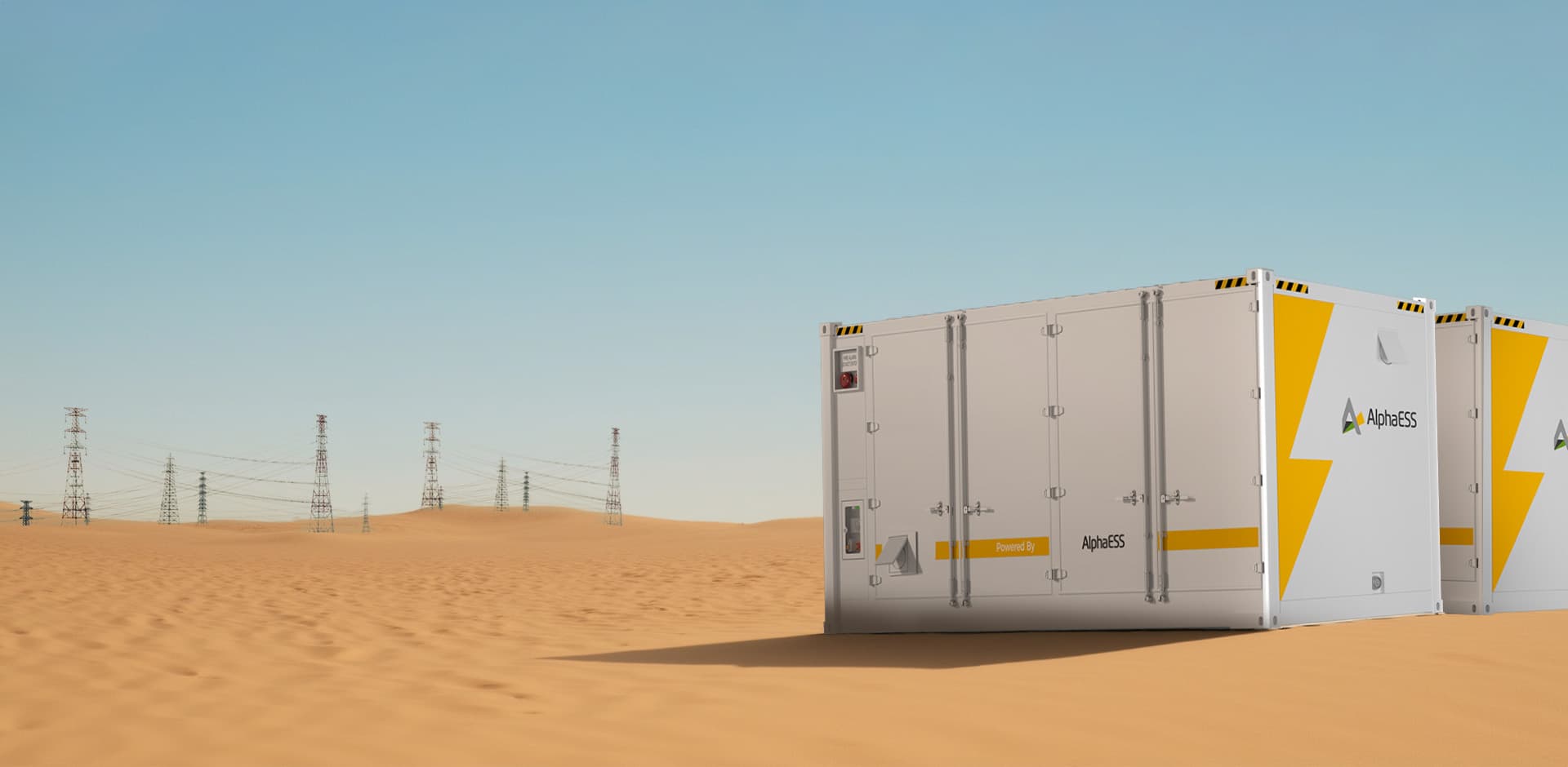 AlphaESS Aster 5000 battery storage containers standing in a desert beside high-voltage transmission towers