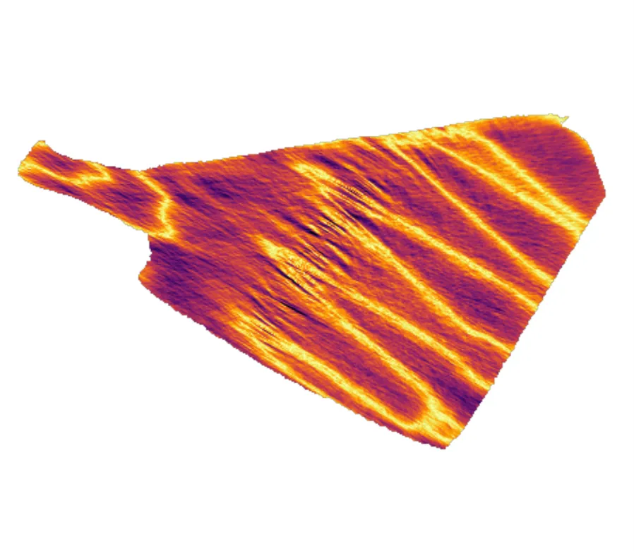 False-colour map of a 214 cuprate crystal from the Warwick and ESRF study, showing bright stripes between darker regions