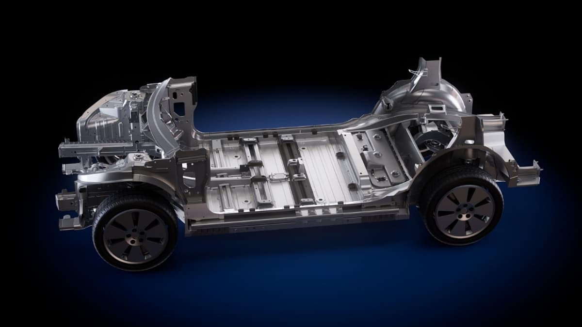 Rendered vehicle chassis of GM's fourth-generation EV platform, shown from the side on a dark blue background