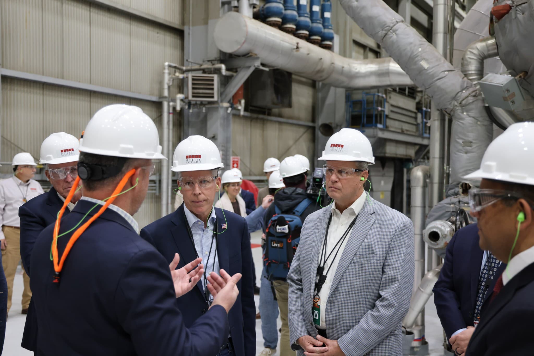 Energy Secretary Chris Wright and officials in the Turbine Building at Holtec's Palisades nuclear plant, Covert Township, Michigan