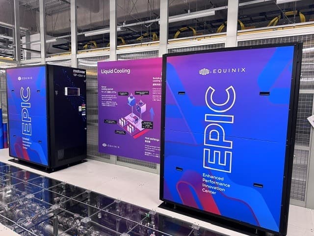 Equinix EPIC liquid-cooling demonstration units with Equinix branding beside a Liquid Cooling display panel
