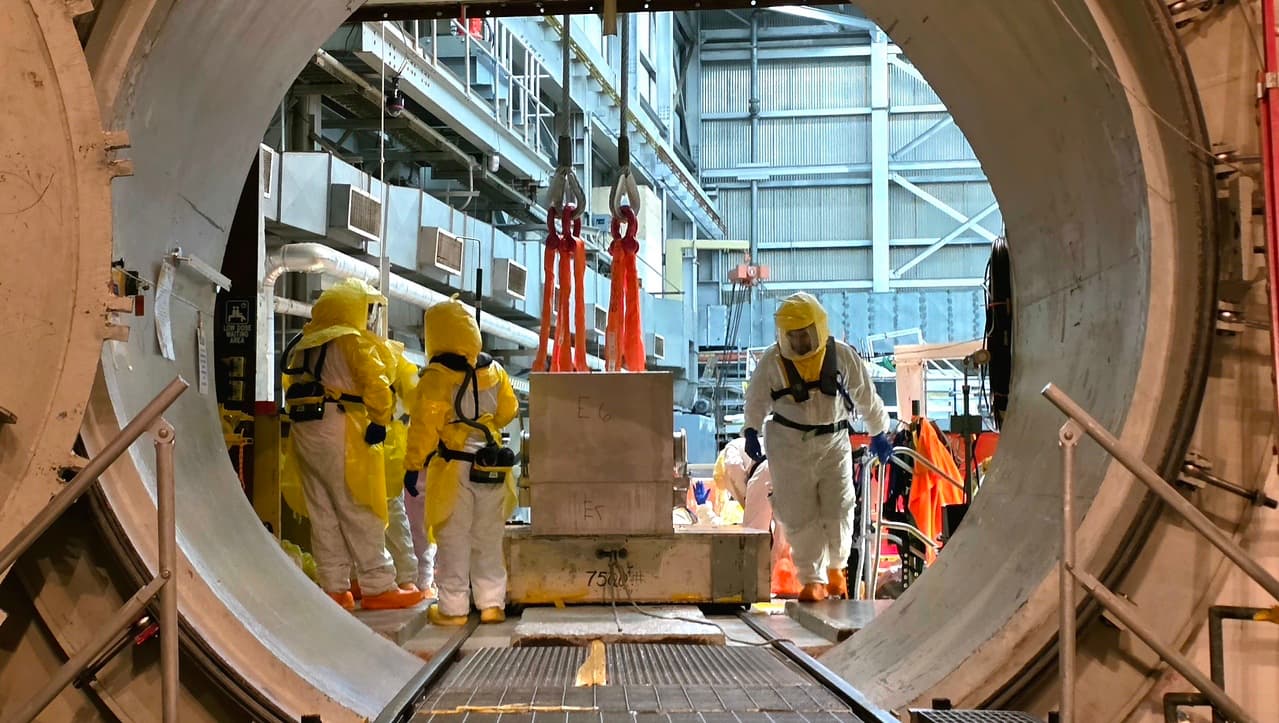 Holtec workers move a fuel-transfer canister at the Palisades plant in Covert, Michigan.