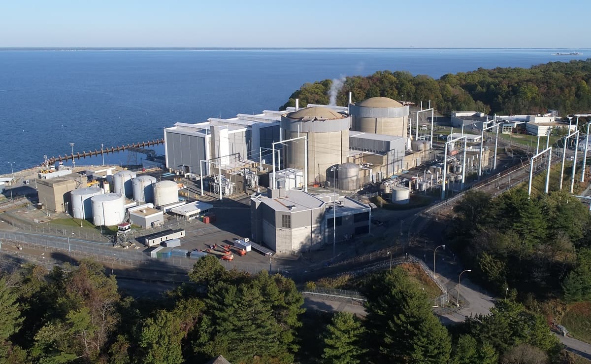 Aerial view of the Calvert Cliffs nuclear plant in Maryland, showing the reactor containment buildings, switchyard and waterfront