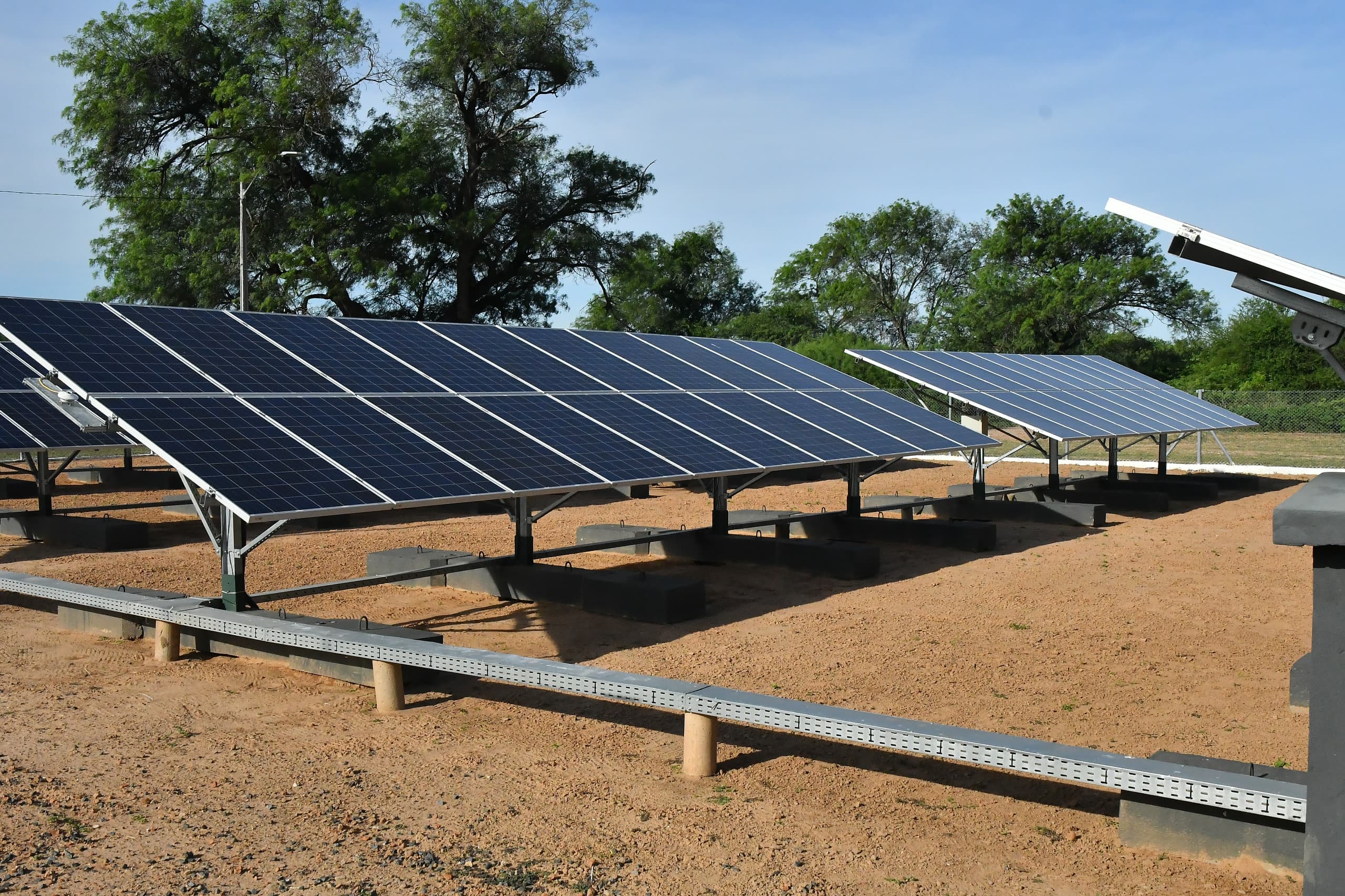 Rows of ground-mounted solar panels on concrete footings at a site in Paraguay, from Itaipu's news page