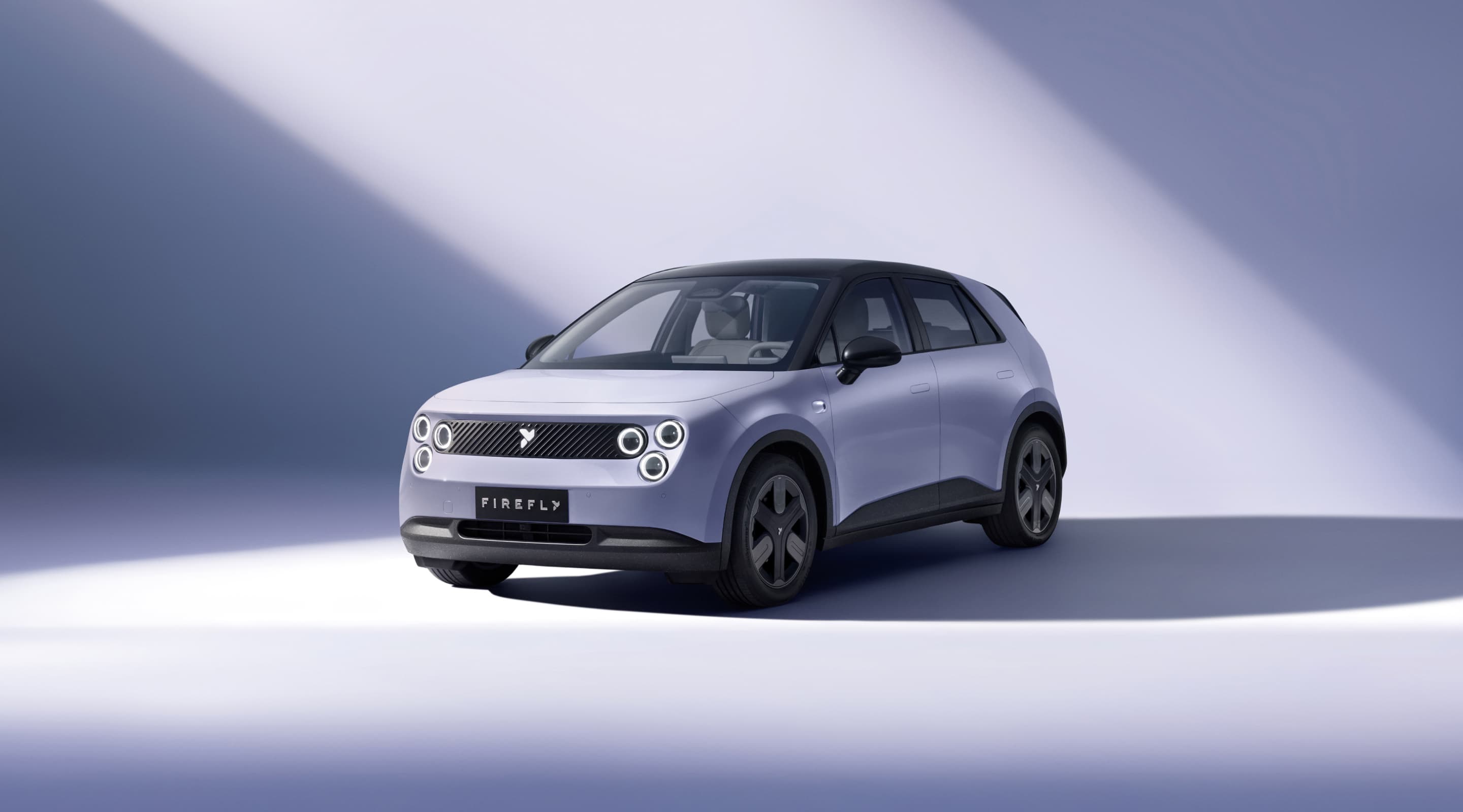 Nio Firefly hatchback in lavender with a black roof, front three-quarter view in a studio